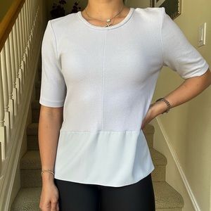 Beautiful office top with a subtle peplum